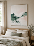 Minimalist textured mountain wall art displayed above a bed in a calm neutral bedroom