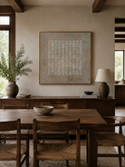 Wabi-sabi textured geometric artwork displayed in an organic modern open-plan dining room