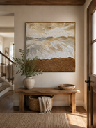Wabi-Sabi neutral coastal painting displayed above a wood console in an organic modern entryway
