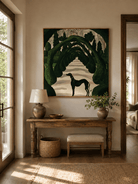 Black greyhound and topiary garden painting displayed above a console in an elegant entryway