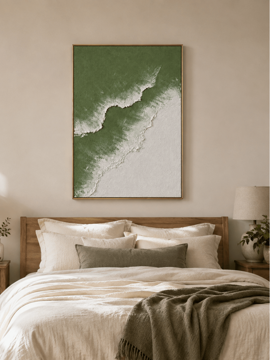 Minimalist sage green coastal wall art displayed above the bed in a calm neutral bedroom