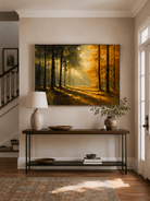 Horizontal autumn forest painting displayed above a wood console in a warm modern entryway