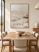 Large hand-painted textured abstract landscape wall art displayed in a modern open-plan dining room
