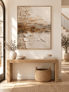 Vertical modern organic abstract landscape painting displayed above a console in a neutral entryway