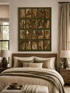 Textured dark green and antique gold abstract painting displayed in a sophisticated neutral bedroom