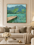 Large turquoise mountain lake landscape painting displayed above a cream sofa in a contemporary living room