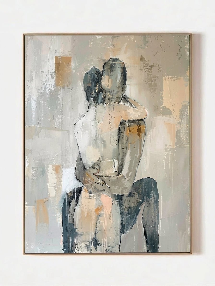Hand-painted abstract romantic couple canvas painting featuring a seated embrace in neutral beige, gray, ivory, and black tones with textured contemporary brushstrokes.