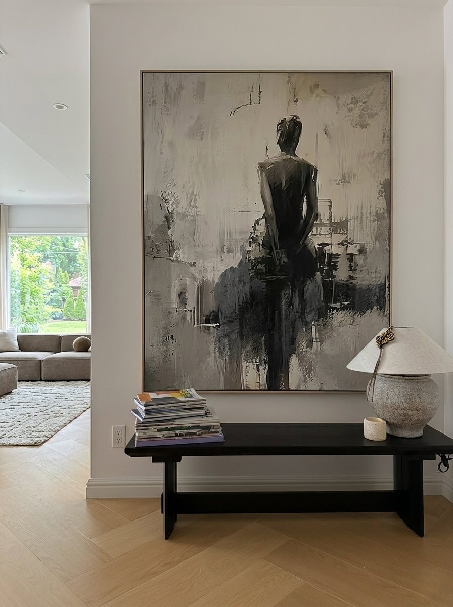 Heavy texture hand-painted abstract ballerina canvas painting in warm gray, cream, and charcoal black by Eleanor Hayes for organic modernist wall decor.
