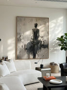 Heavy texture hand-painted abstract ballerina canvas painting in warm gray, cream, and charcoal black by Eleanor Hayes for organic modernist wall decor.
