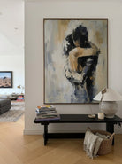 Hand-painted abstract romantic couple painting featuring two embracing figures in neutral beige, gray, black, and ivory tones with textured contemporary brushstrokes on canvas.