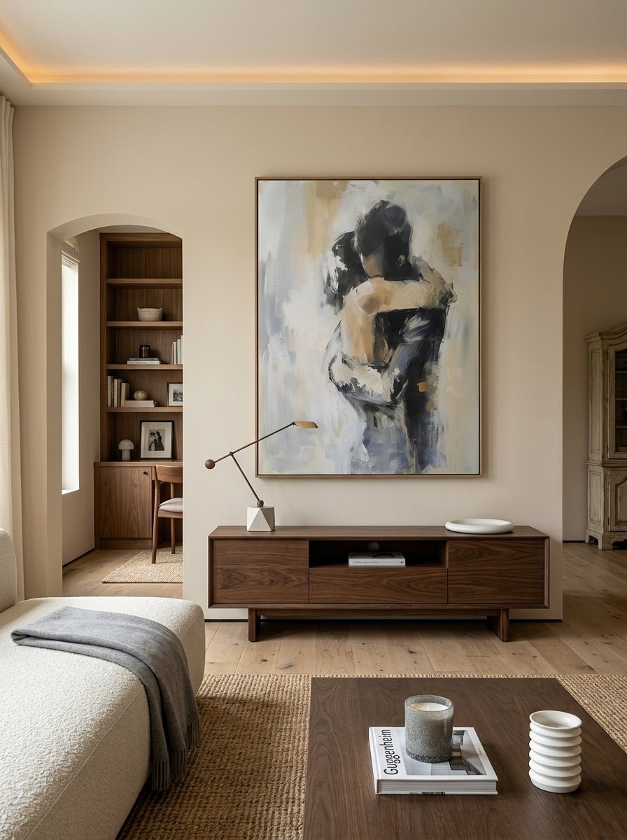 Hand-painted abstract romantic couple painting featuring two embracing figures in neutral beige, gray, black, and ivory tones with textured contemporary brushstrokes on canvas.