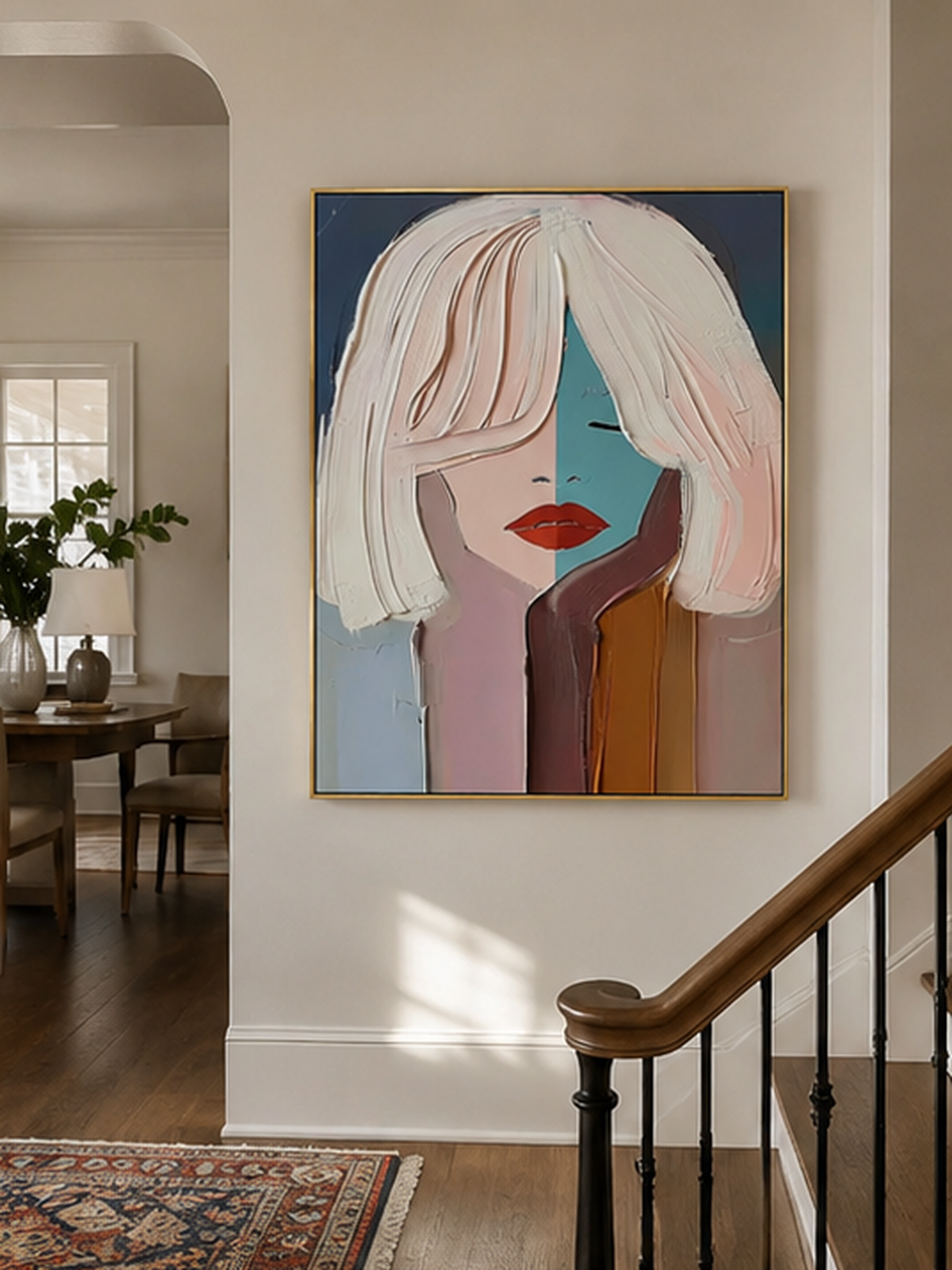 Geometric abstract woman wall art above an entryway console in a contemporary foyer