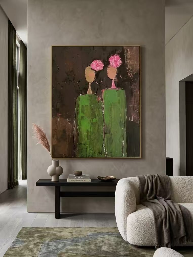 A vertical hand-painted 3D textured art of two women in green dresses with pink impasto flowers on their heads by Eleanor Hayes.