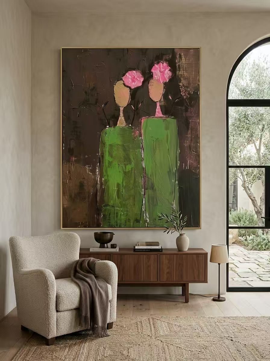 A vertical hand-painted 3D textured art of two women in green dresses with pink impasto flowers on their heads by Eleanor Hayes.