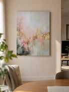 Large hand-painted modern abstract canvas painting with 3D textured gold leaf and blush pink brushstrokes by Evelyn Li for luxury master bedroom wall decor.