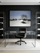  Large horizontal hand-painted minimalist oil painting of a single dark tree in a vast white snowfield under a soft blue sky.