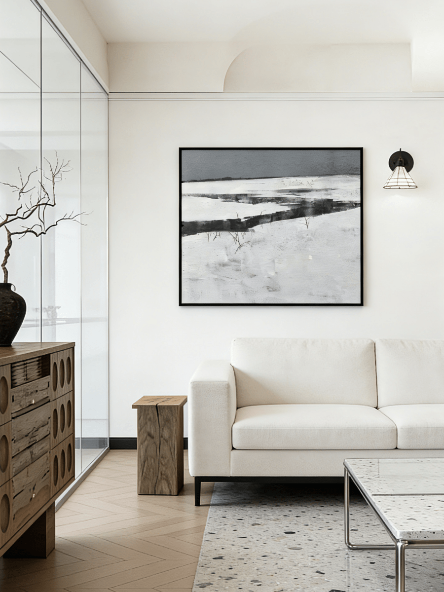 hand-painted abstract oil painting showing a dark winter river winding through a white snowfield in a minimalist style.