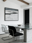 hand-painted abstract oil painting showing a dark winter river winding through a white snowfield in a minimalist style.