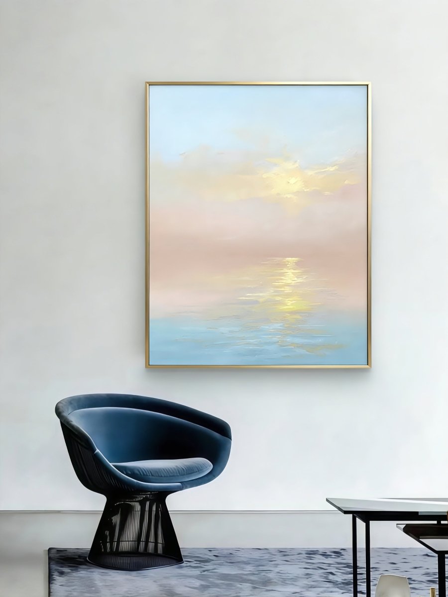 Large vertical hand-painted impressionist sunset seascape in pastel pink and blue with golden light reflections by Evelyn Li in a minimalist bedroom.