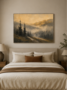 Warm neutral misty mountain wall art displayed above the bed in a calm Japandi bedroom