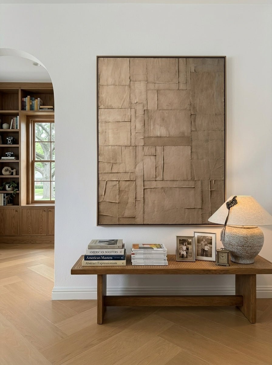 Large hand-painted geometric abstract canvas painting with heavy plaster texture in taupe and brown by Eliot Vermeer for minimalist living room decor.