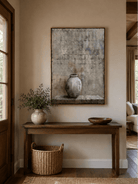 Wabi-sabi vase wall art above an entryway console in a neutral organic modern foyer