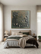 Organic textured stone tile canvas artwork by Eliot Vermeer displayed above bed in zen wabi-sabi bedroom
