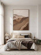 Tactile cream and brown sand dune artwork by Evelyn Li hanging in serene wabi-sabi minimalist bedroom