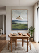 Oversized vertical moss green landscape canvas art displayed on an open-concept dining room wall
