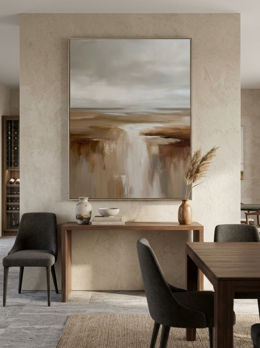 Oversized vertical earthy textured canvas wall art displayed on a minimalist open-concept dining room wall
