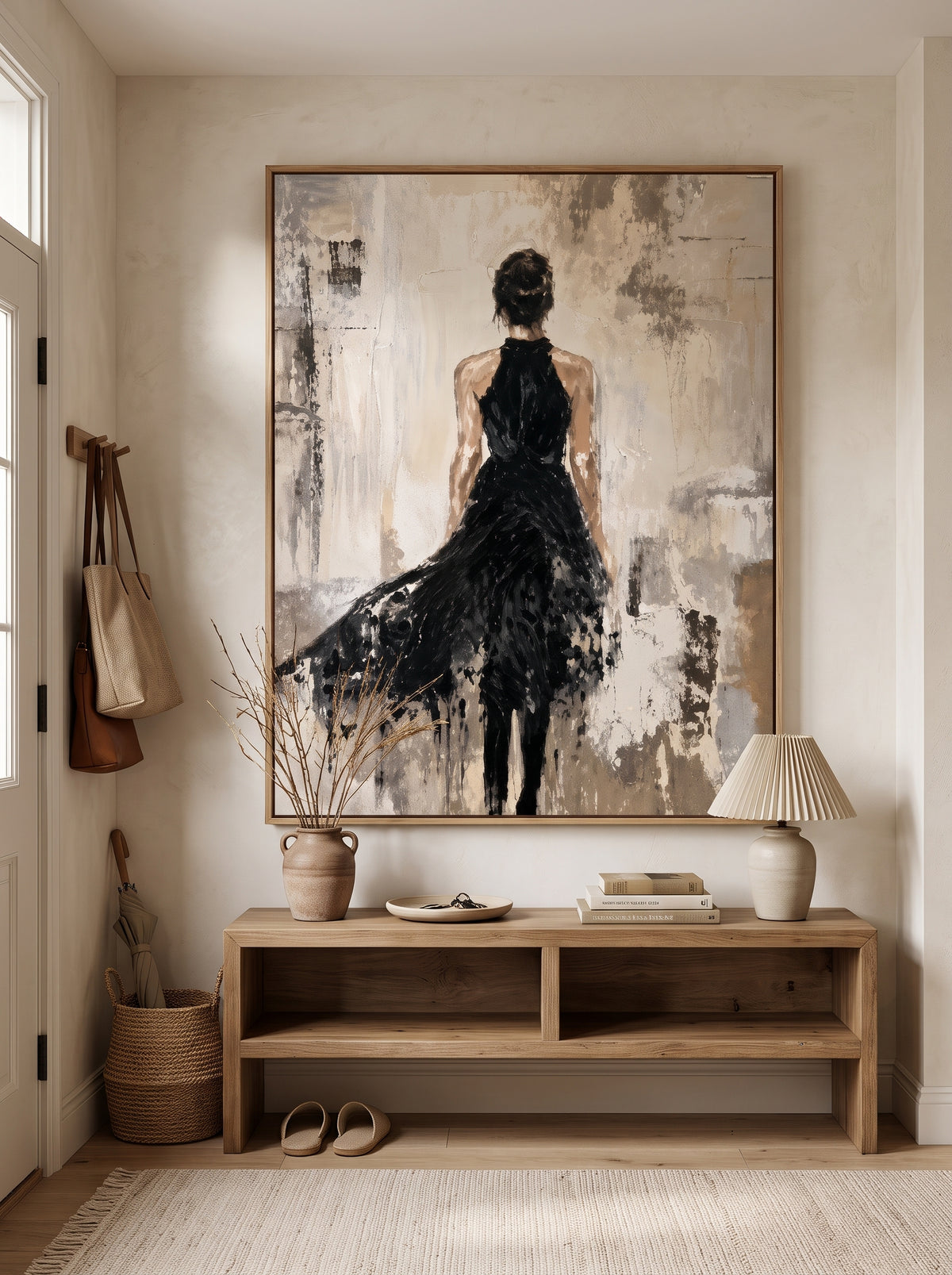 Modern figurative painting of a woman in a flowing black dress displayed in a sophisticated neutral entryway.