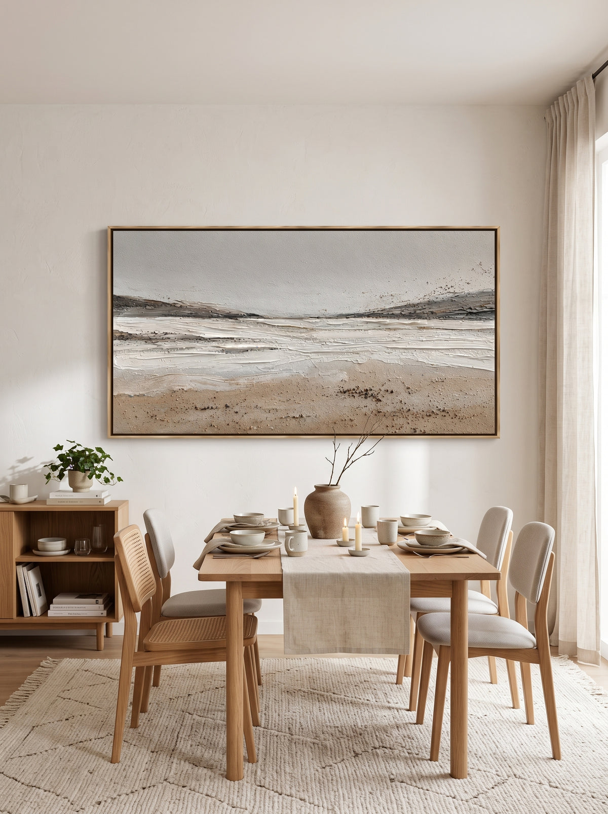 Framed horizontal textured sandy beach artwork displayed in contemporary open-concept dining room