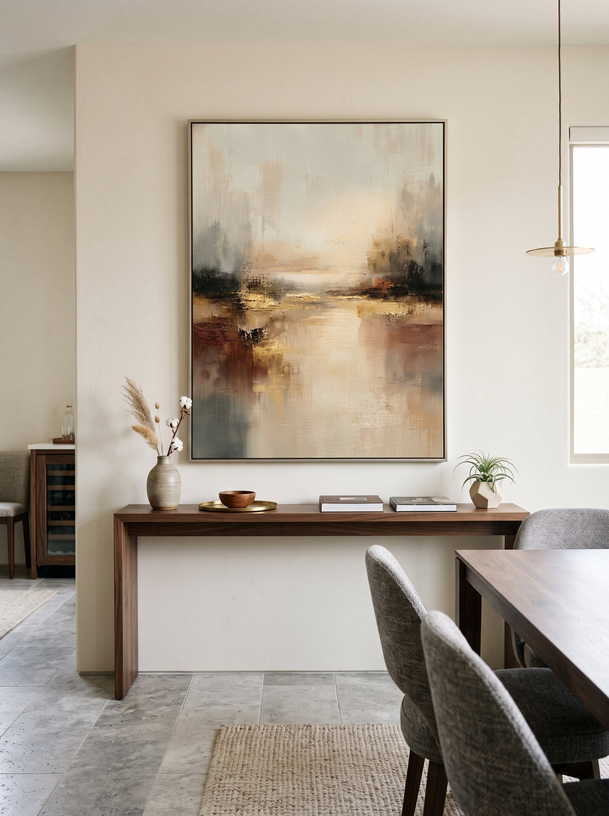 Oversized vertical warm beige and amber landscape canvas art displayed on an open-concept dining room wall