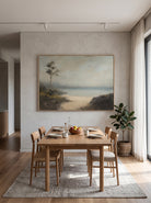 Large horizontal textured coastal path wall art displayed on a minimalist open-concept dining room wall