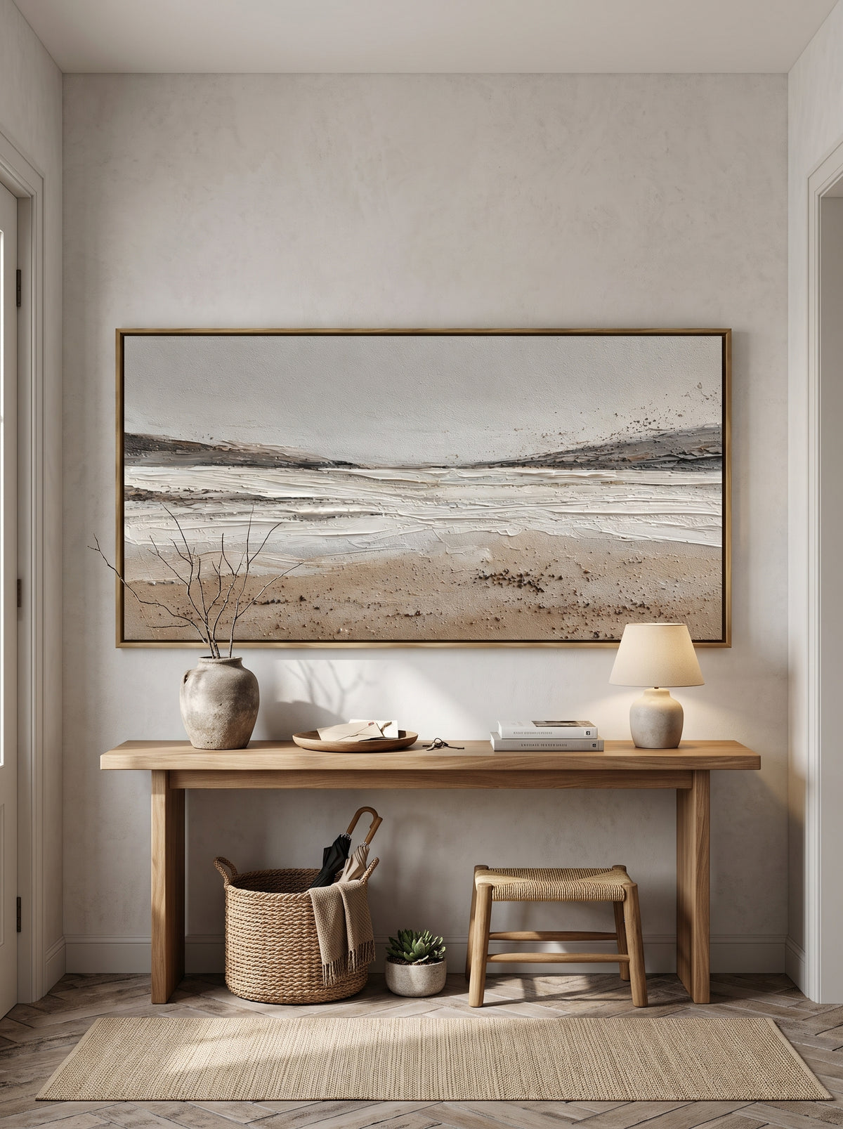 Minimalist horizontal coastal horizon canvas painting mounted above wooden console table in bright entryway
