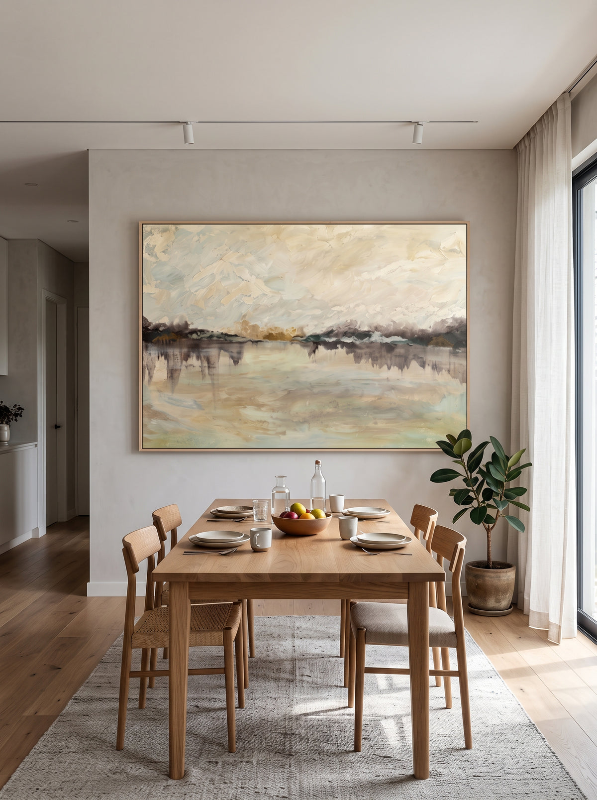 Large horizontal textured impressionist waterscape canvas art displayed on an open-concept dining room wall