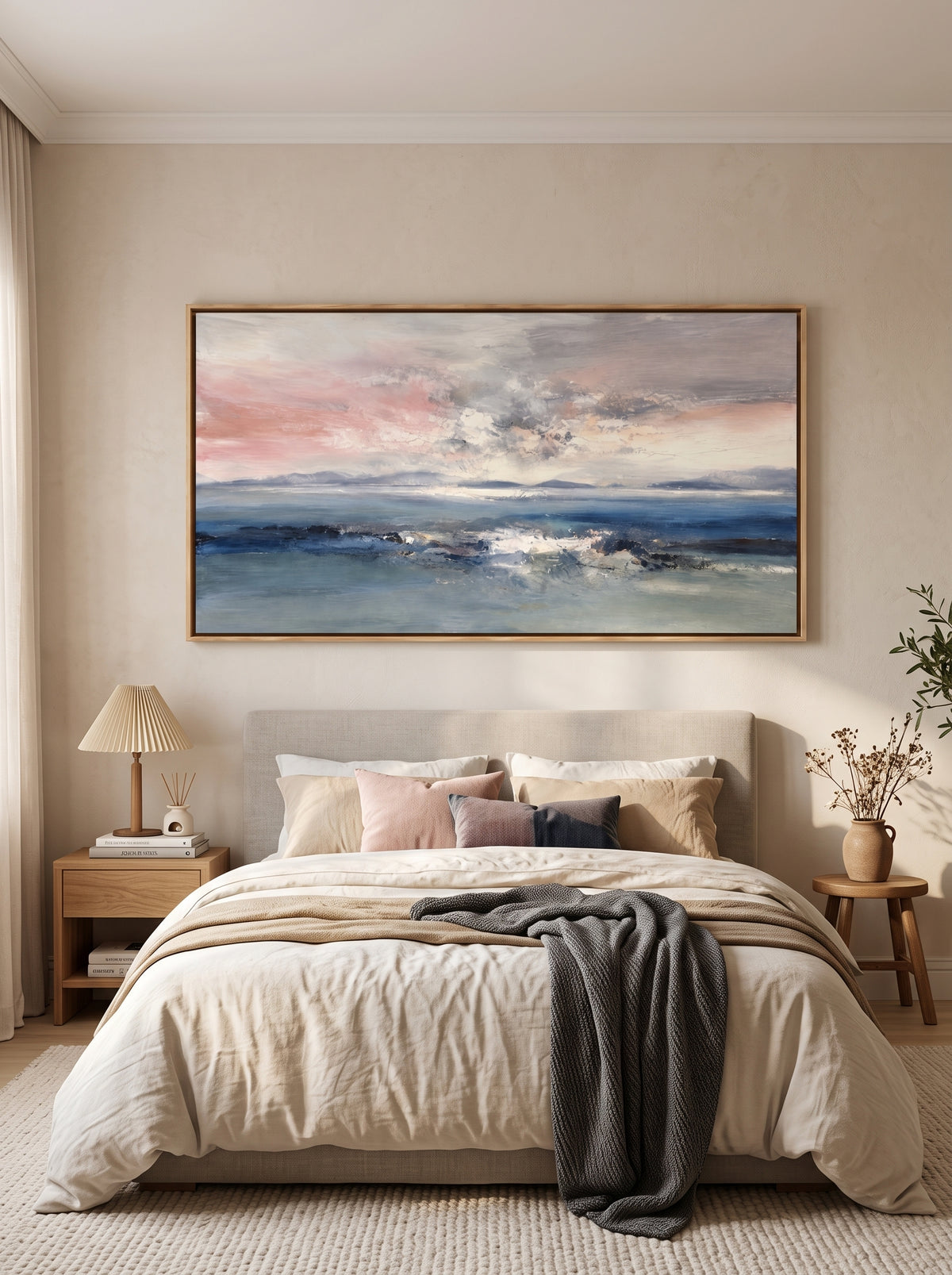 Hand-painted blue and pink coastal seascape wall art displayed above the bed in a calm contemporary bedroom.