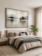 Neutral textured abstract landscape painting by Evelyn Li hanging above bed in serene organic modern bedroom