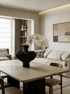 sculptural fluted ceramic vases in black, cream, and terracotta rust, organic heart-shaped silhouette, artistic home decor.