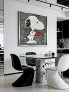 graffiti painting featuring a cartoon dog holding a red heart with "Love is the Answer" text on a textured gray background.