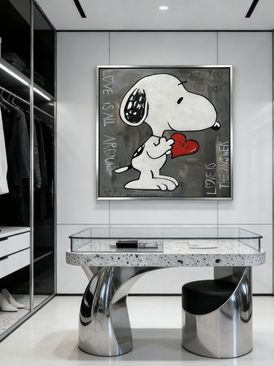 graffiti painting featuring a cartoon dog holding a red heart with "Love is the Answer" text on a textured gray background.