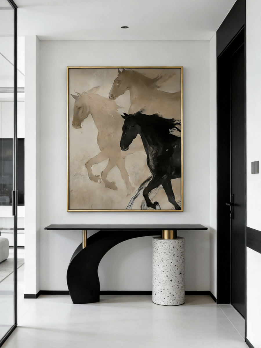 Large hand-painted painting showing three horses running in a mist of beige and charcoal tones with expressive brushwork.