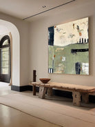 Large square hand-painted abstract oil painting with sage green and cream textures, modern Wabi-sabi wall art by Akari Kobayashi for minimalist living room decor.