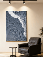 Textured abstract seascape artwork displayed in contemporary living room, showcasing coastal wall decor in modern interior