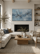 Large hand-painted blue textured abstract ocean wave wall art on panoramic canvas for modern living room decor