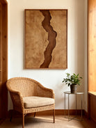 Brown and beige abstract river wall art displayed in modern living room, showing earthy tone decor
