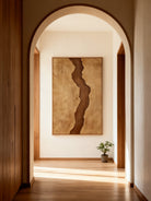 Brown and beige abstract river wall art displayed in modern living room, showing earthy tone decor