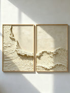 Hand-painted white ocean diptych wall art with heavy texture on two canvas panels