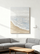 Textured beach painting displayed in modern living room, showcasing coastal wall art in home decor setting