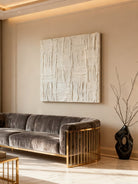Plaster texture wall art displayed in contemporary living room interior